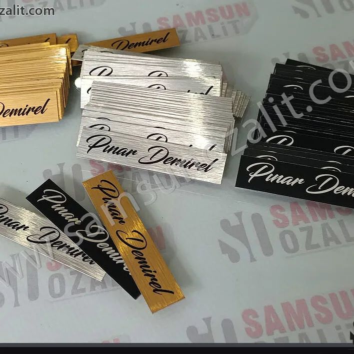 Samsun, Metal etiket üretimi, metal levha baskısı, reklam etiketi baskısı, Metal etiket baskısı, altın, gümüş, siyah metal, üretimi, tablo altına isim baskısı, el emeği üretimi ürünlerine, üreten kişinin isim baskısı, metal isim baskılı etiketler