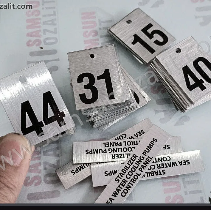 metal etiket baskısı, üzeri delikli, sıra numarası baskılı ürün, deliklerden bağlama yapılabilir, ağaç numarası, olarakta kullanılabilir, baskılı delikli, metal etiket üretimi